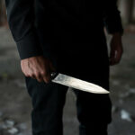 man holding knife in his hand